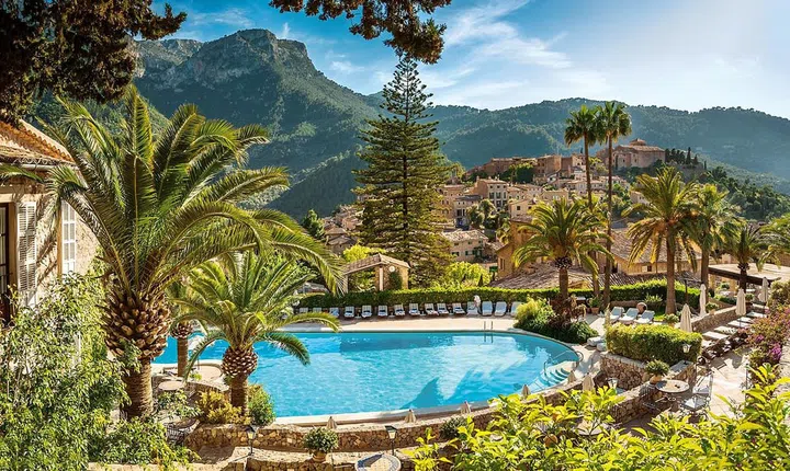 Located in the bohemian enclave of Deià, La Residencia is one of Mallorca’s most idyllic hideaways. It was owned by Richard Branson in the 80s, and it was where Princess Diana famously took refuge when her marriage unraveled. The secluded resort is set in an amphitheater of mountains, surrounded by a sculpture garden and views of the Mediterranean. Famous faces that can often be found here include Tom Hiddleston, Kirsten Dunst, Paris Hilton, Leonardo DiCaprio, and Gwyneth Paltrow, among many others.