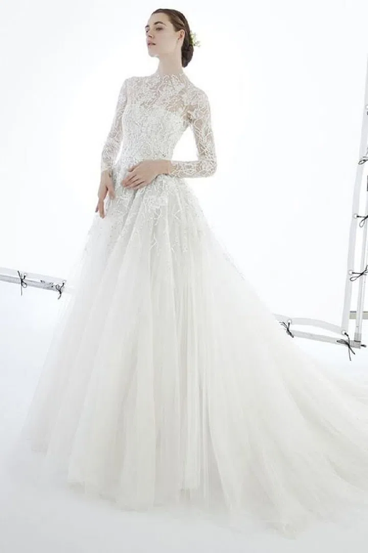 Peter Langner's tailoring expertise and understanding of classic silhouettes make him the perfect candidate to deliver the type of traditional feel brides loving Pippa's look are after. This silhouette from his Spring 2017 collection, while a bit lighter in the skirt and more embroidered in the bodice, feels spot on.

Peter Langner "Belle" gown, price upon request, peterlangner.com
