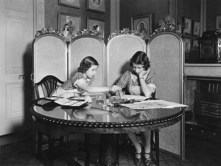 Artists in the making: Margaret and Elizabeth painted together in Buckingham Palace. The girls were raised at the historic palace, which is the official home of the reigning monarch.
Photo: Getty