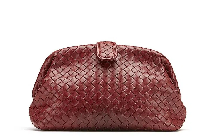During Bottega Veneta's spring/summer 2017 show, Lauren Hutton graced the catwalk carrying her elegant namesake clutch in Gigolo Red. The Lauren 1980, £1,575, Bottega Veneta