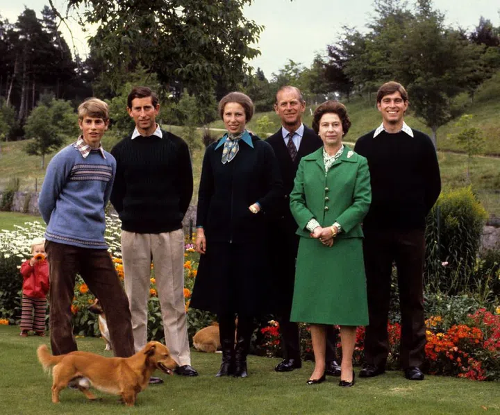 The Queen and Prince Philip smile alongside Prince Charles, Princess Anne, Prince Andrew, and Prince Edward at Balmoral Castle. By this time, the Queen and Philip were already grandparents: in 1977, Anne welcomed her first child, Peter Phillips.
Photo: Getty
