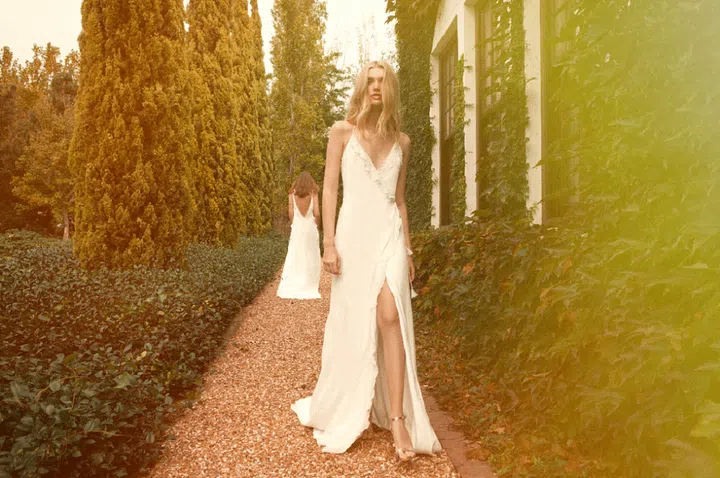 Inspired by exotic cultures, nomadic travel and "the romance of bohemia" paired with a nostalgia for eras gone by, Bo & Luca should be your go-to for easy styles that don't skimp on special details. Think sexy, effortless, slips with a thigh-high slit, beaded sheaths with sexy, open backs and an overall ease that perfectly suits a garden, beach or woodland affair. Based in Australia and with a flagship in Cape Town, it's no wonder why this brand designs for the no-fuss bride with a dreamy sense of adventure.