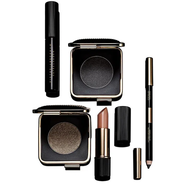 Clockwise from top left:
Victoria Beckham Estée Lauder Eye Foil in Blonde Gold ($36) Sparkling pearl pigments add gold flecks in this liquid liner that dries with a vinyl gloss.
Victoria Beckham Estée Lauder Eye Ink in Black Myrrh ($45) A pressed gel-cream that can be used wet, like a liner, or dry, like a shadow.
Victoria Beckham Estée Lauder Eye Kajal Duo in Black Saffron/Vanille ($30) 
Victoria Beckham Estée Lauder Lipstick in Brazilian Nude ($45) Posh Spice's signature nude lip in a single handy bullet.
Victoria Beckham Estée Lauder Eye Metals Eyeshadow in Bitter Clove ($45) A riveting blonde gold that looks like jewelry on your lids. Photo: Estée Lauder

