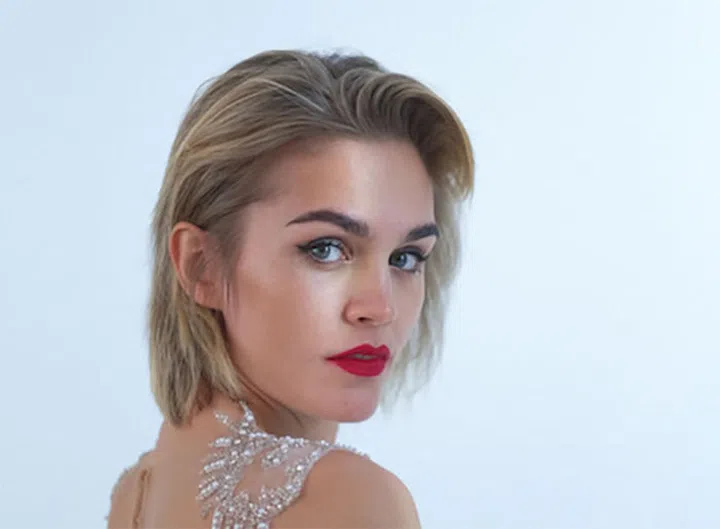 The classic matte-red lipstick at Galia Lahav got a cool-bride update by keeping the hair perfectly messy and undone.