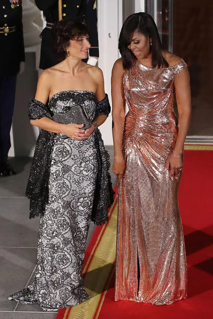 For her final State Dinner as FLOTUS, Michelle Obama wore an incredible rose gold gown by Versace and completely lit up the White House.