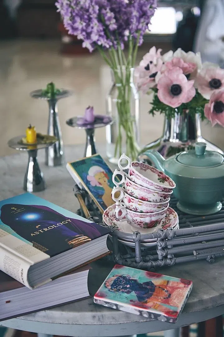Georg Jensen vases and candle holders sit pretty alongside a vintage tea set. (Photo: Veronica Tay)