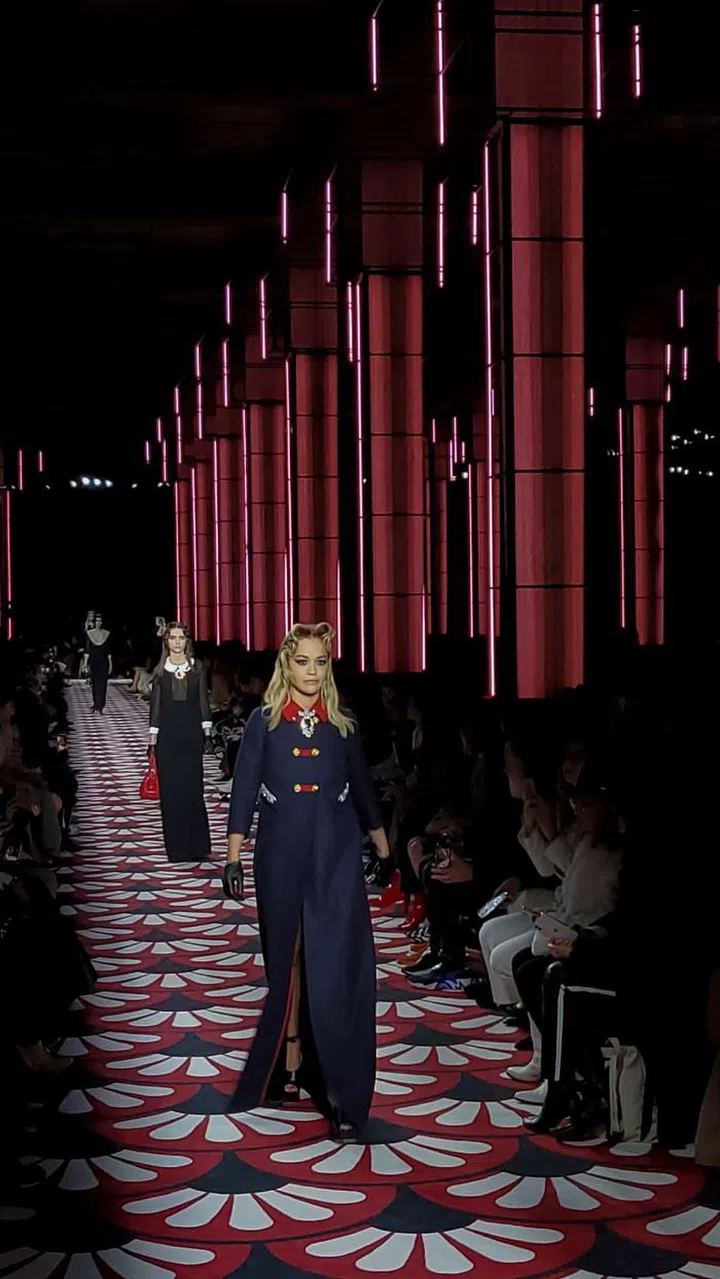 Rita Ora and other stars walk the Miu Miu runway.