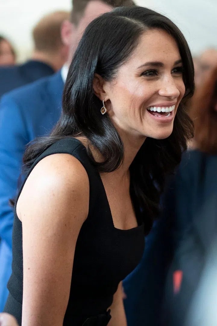 The duchess looked happy and relaxed as she mingled with guests at the party.

Photo: Getty