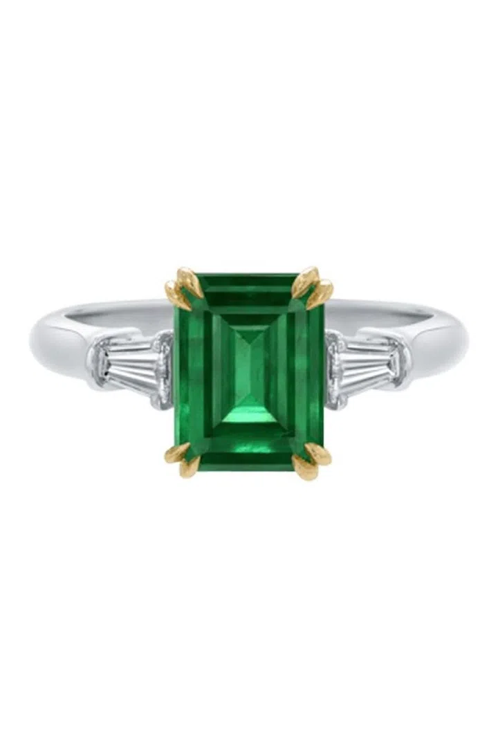 This emerald-cut ring has the perfect balance of detail and timeless elegance with a pop of rich emerald green. Harry Winston Emerald Ring, from a selection