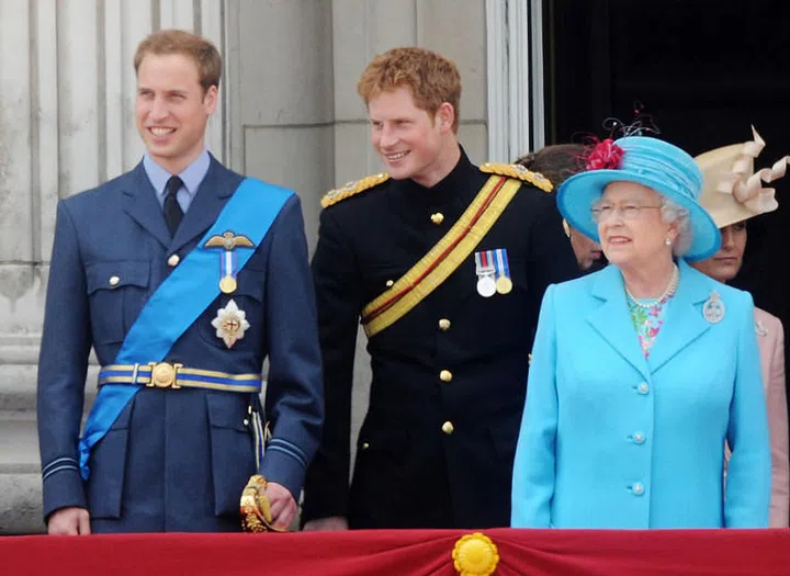 Prince William (left), Prince Harry (center) and Queen Elizabeth II (right) in 2008.
Photo: Getty