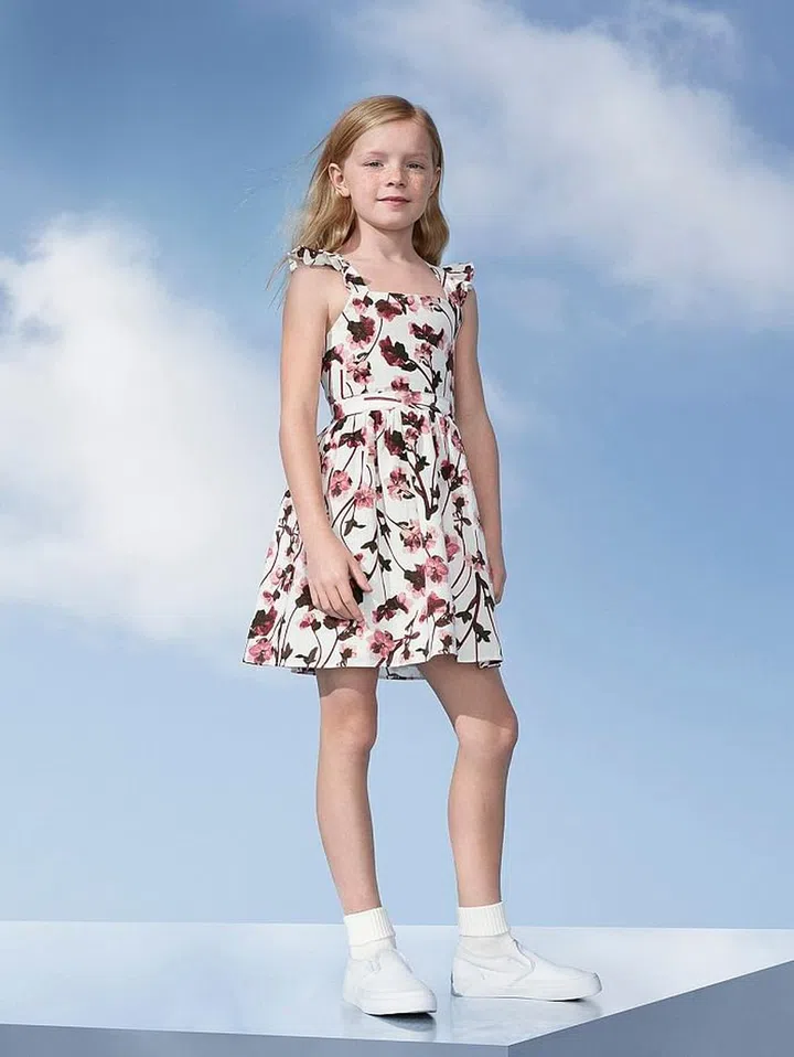 Girls' White Ruffle Strap Dress, $25. Photo: Target 