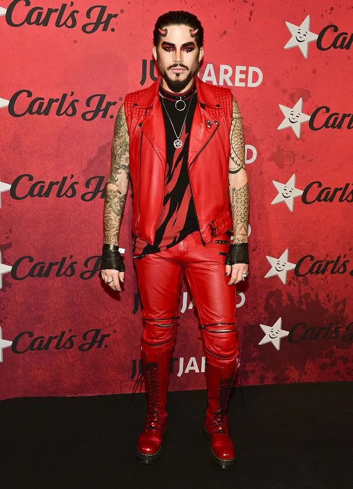As a devil.