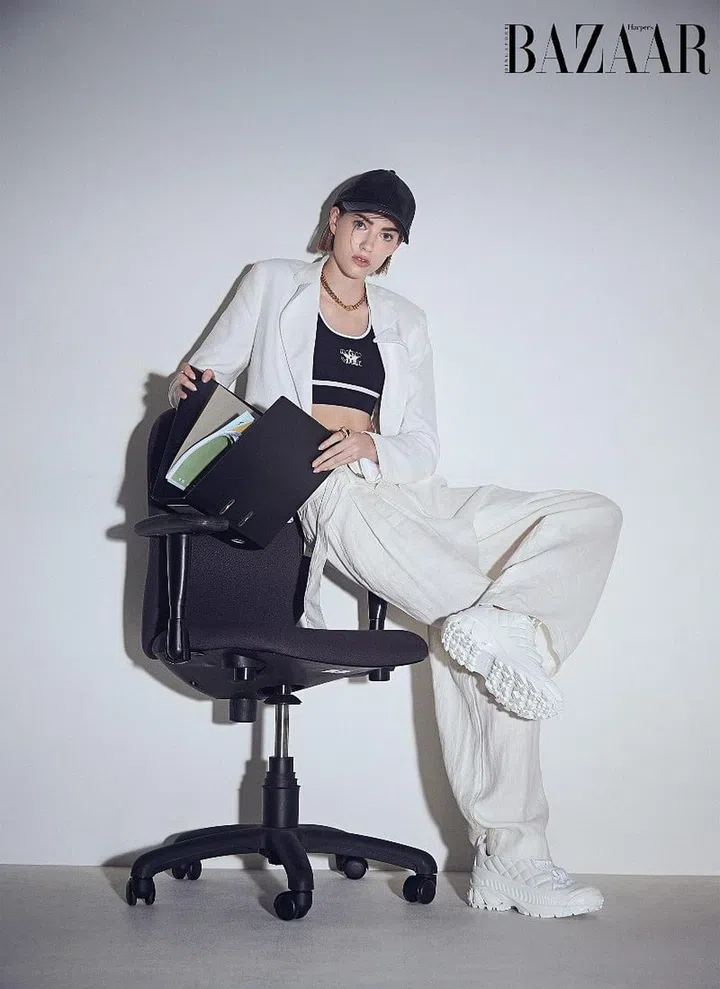 Blazer; trousers, Polo Ralph Lauren. Bra top, Dior. Sneakers, Burberry. Cap, Coach. Necklace; ring, CELINE

Photo: Phyllicia Wang