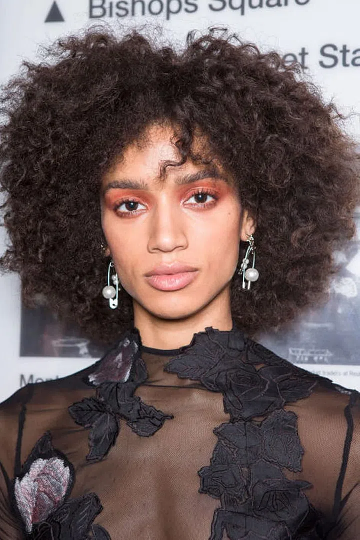 A warm peach eyeshadow was used backstage at Topshop Unique.