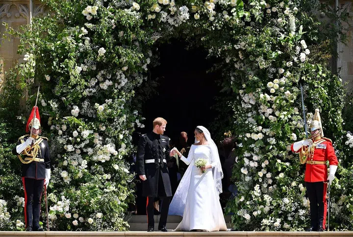 Prince Harry and Meghan Markle leaving at St. George's Chapel