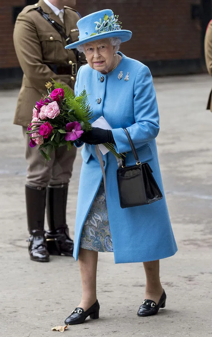 Queen Elizabeth makes so many royal appearances, all of which usually require heels or dressy shoes. Since she's constantly on her feet, having someone to break in her shoes means she skips all the uncomfortable rubbing and blisters that come with wearing new shoes. In an interview with Evening Standard, designer Stuart Parvin said, “The shoes have to be immediately comfortable … she does get someone to wear them. The Queen can never say, ‘I’m uncomfortable, I can’t walk any more.' "

According to the publication, a staff member will wear a pair of beige cotton ankle socks while breaking in the Queen's shoes can only walk carpet during this period. Dream job, right?
Photo: Getty
