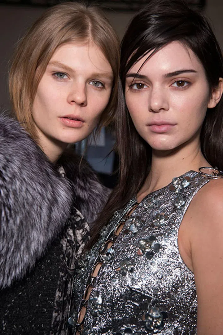 Even for autumn/winter shows, there is usually a hint of bronze at Michael Kors. This season, however, there was only the slightest touch of colour on the eyes. The rest of the look was very pared-back.