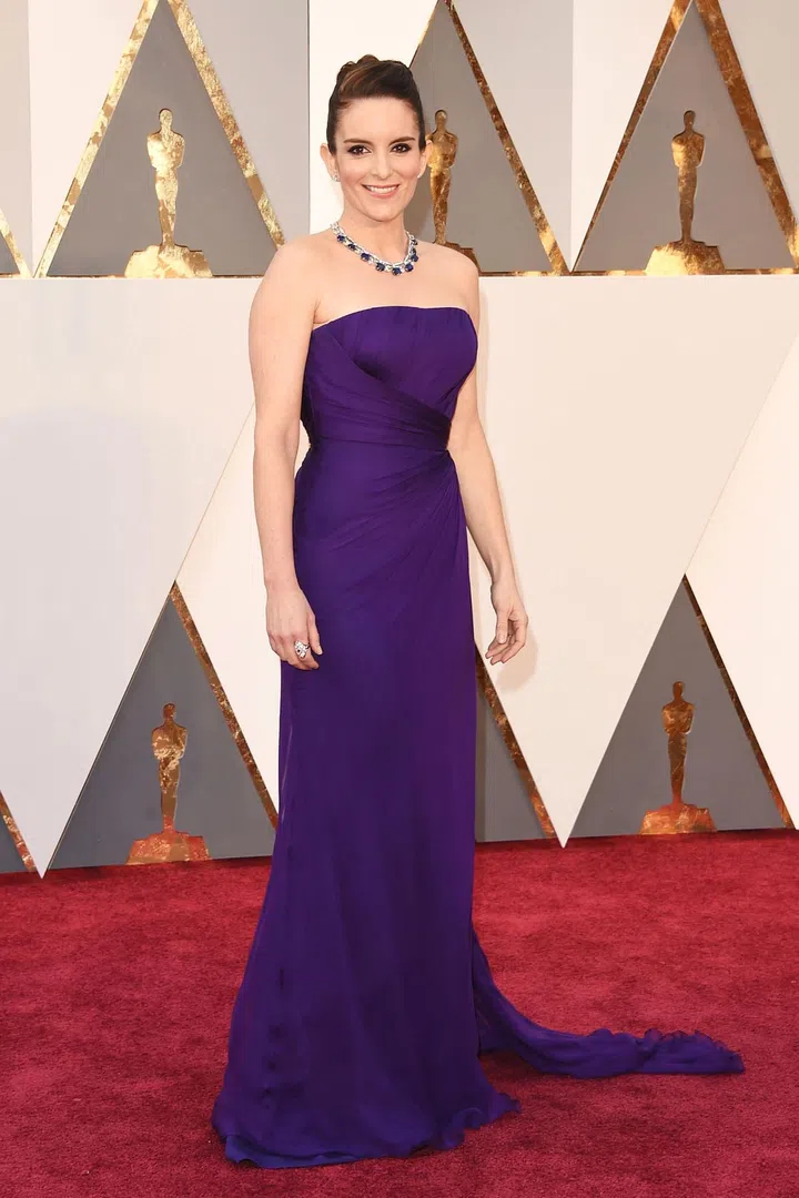 In custom Atelier Versace and Bulgari jewels