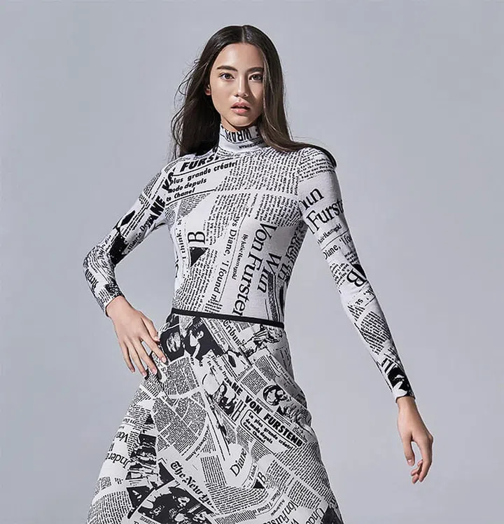 Merino wool turtleneck, $440; crepe skirt, $390.