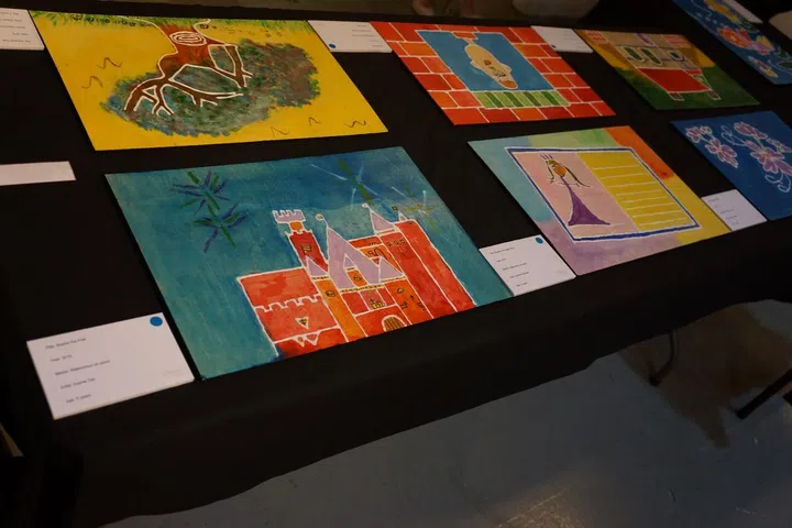Odyssey's children experiment with different types of paint and colours to create creative masterpieces.