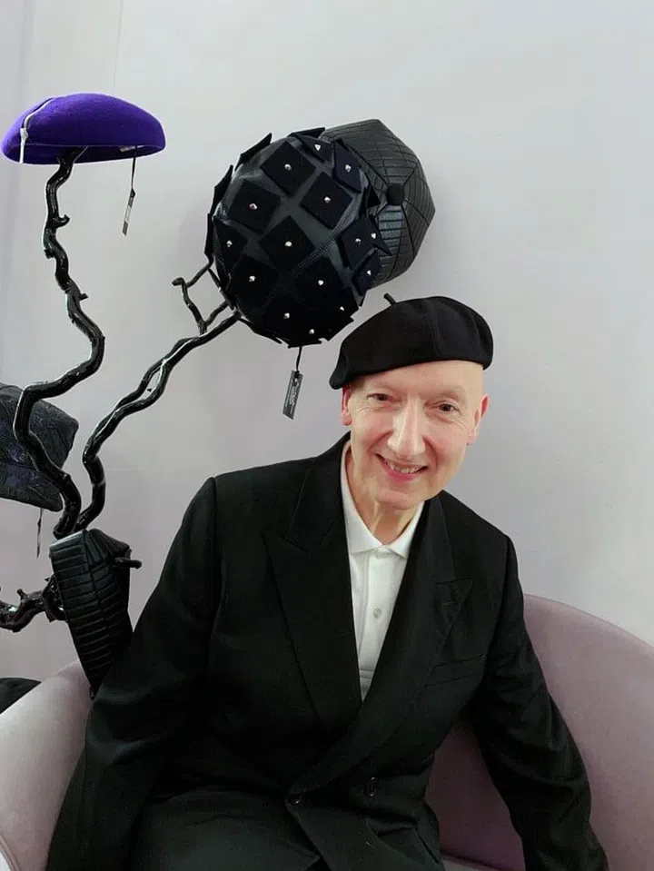 Stephen Jones creates headpieces for brands like Thom Browne, Moschino and Dior, among others, and is definitely a man who wears many hats.