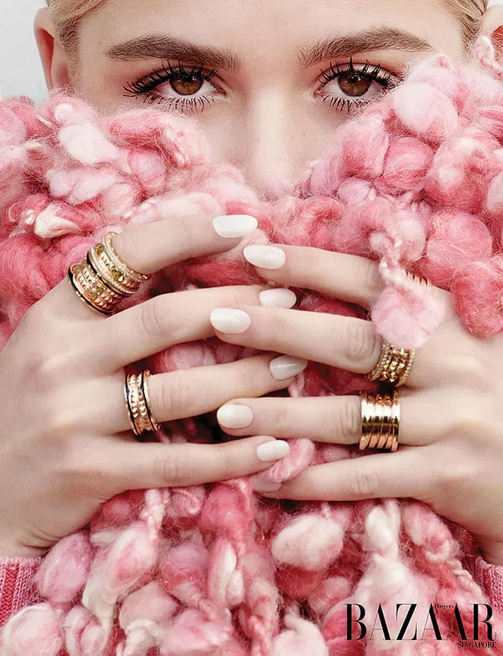 On right hand, from top: Yellow gold and diamond B.zero1 Rock two-band ring; rose gold and ceramic B.zero1 Rock four-band ring; rose gold and ceramic B.zero1 Rock two-band ring; 
On left hand, from top: rose gold B.zero1 four-band ring; yellow gold and diamond B.zero1 Rock four-band ring; yellow gold B.zero1 four-band ring.