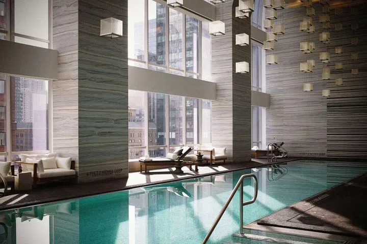 New York's new Midtown property boasts a serene 61-foot lap pool on the 25th floor in a triple-height, sun-drenched space overlooking the city. The pool features underwater speakers piping in an exclusive soundtrack from Carnegie Hall musicians. 