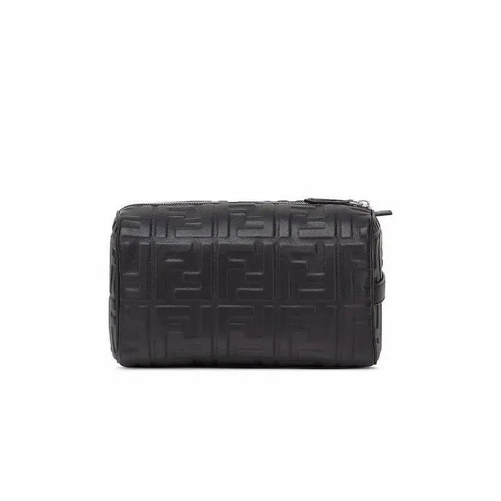 Embossed FF Motif Wash Bag, $1,590, Fendi at Farfetch
