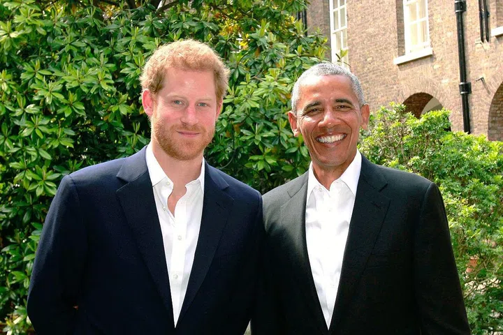 Prince Harry, 32, and Barack Obama pose for a picture after a meeting at Kensington Palace.