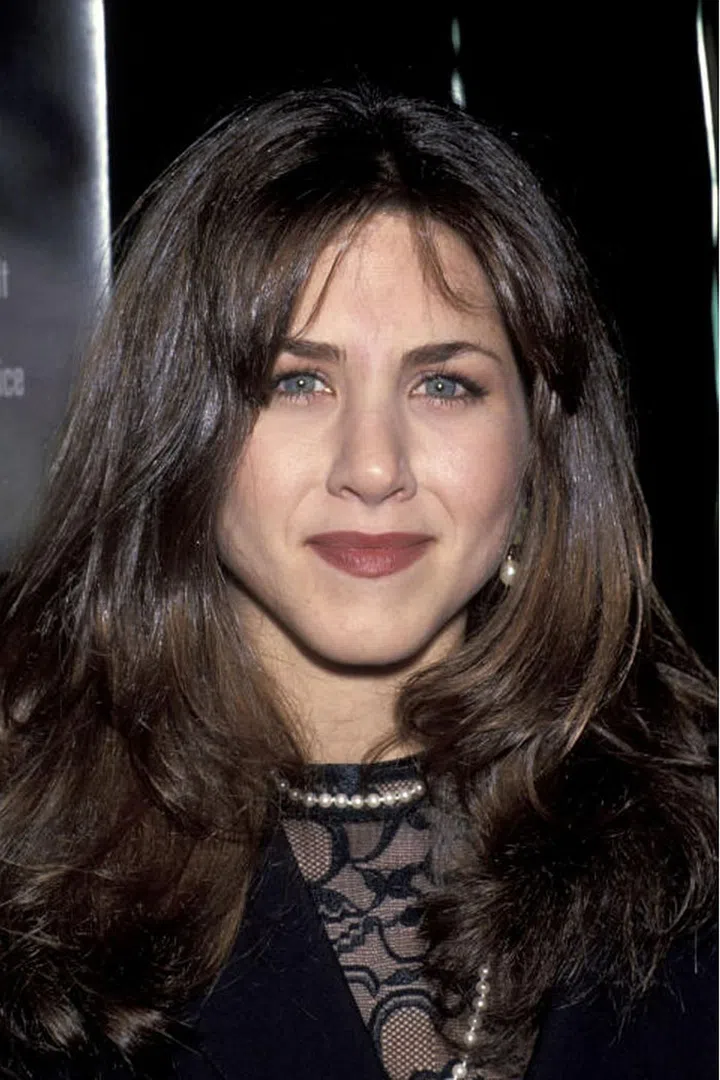 Where: The premiere of Leprechaun, 1992
The style: This is perhaps the darkest Jennifer Aniston has ever gone.Photo: Getty
