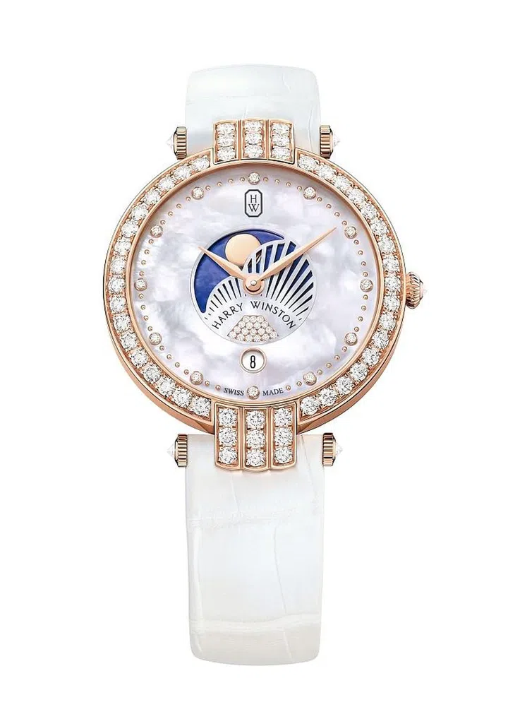 There are 57 brilliant cut diamonds on the case of this watch, plus a white alligator strap that features a rose-gold buckle set with 17 brilliant cut diamonds. <b>Harry Winston, Price Upon Request</b>