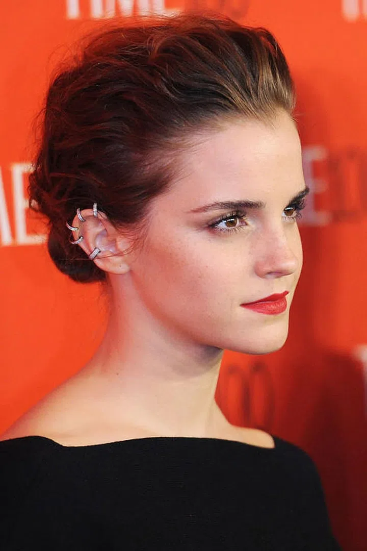 A wavy, textured updo that calls for some major ear candy.
