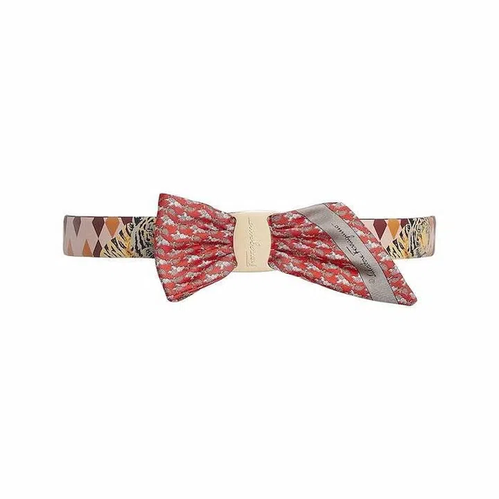 Vara Bow Upcycled Printed Belt, $750, Salavtore Ferragamo at Farfetch