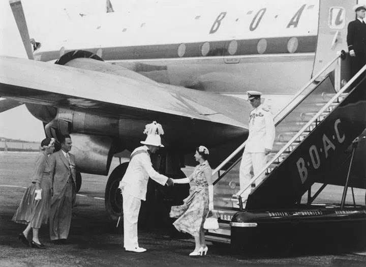 With Prince Philip, Duke of Edinburgh, in 1954. The pair was greeted by Governor of Bermuda , Sir Alexander Hood, upon their arrival during the Commonwealth tour.

Photo: Getty 