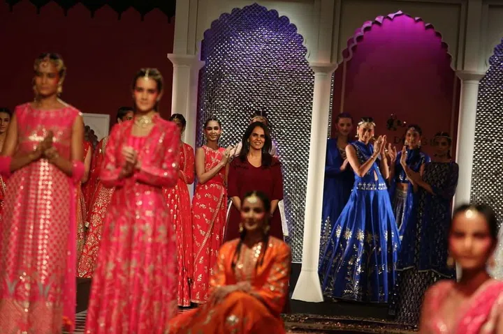 Dongre is an India-based fashion designer known for her extravagant couture bridal designs and lavish evening wear. Recently, Dongre gained more recognition for the dress she designed for Kate Middleton, which the Duchess wore on her recent trip to India. Photo: Getty