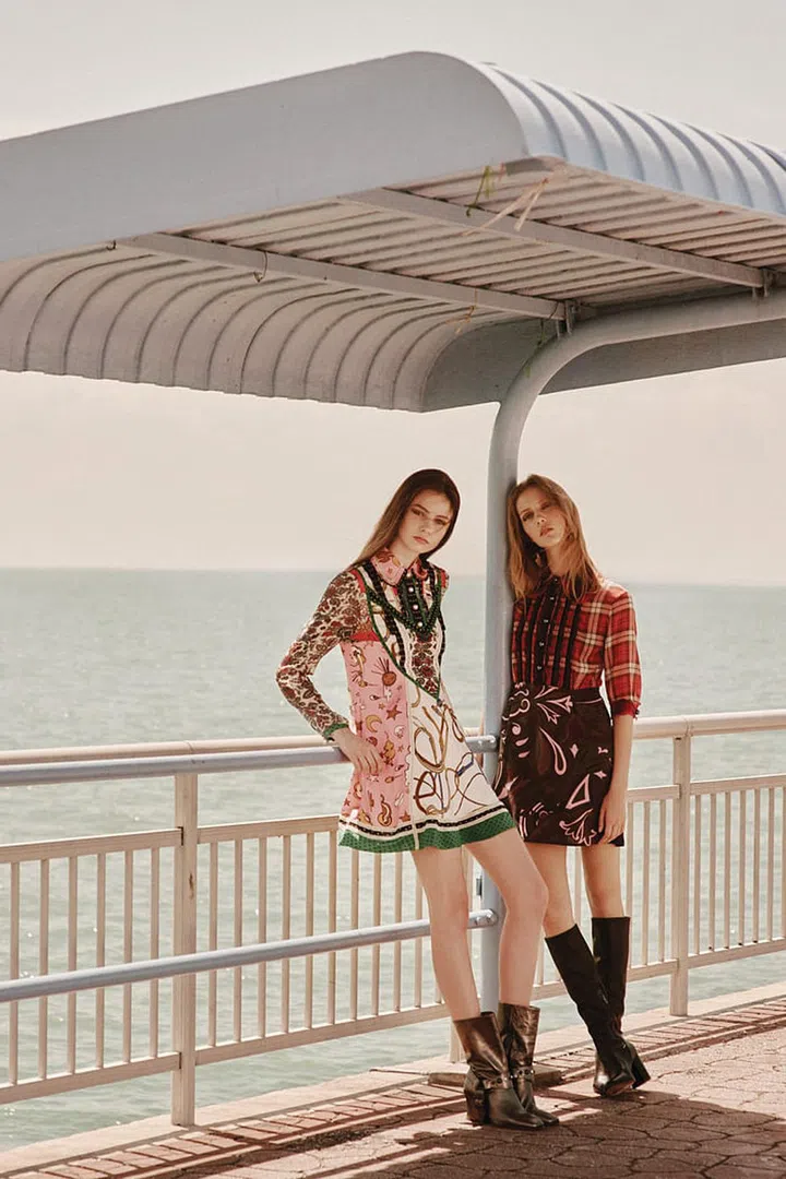 (Left) Silk Victorian print dress; leather boots. (Right) Silk Plaid and Scarf dress; leather boots
