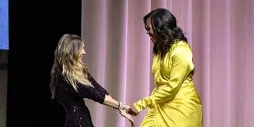 Michelle Obama in Balenciaga thigh-high knife boots