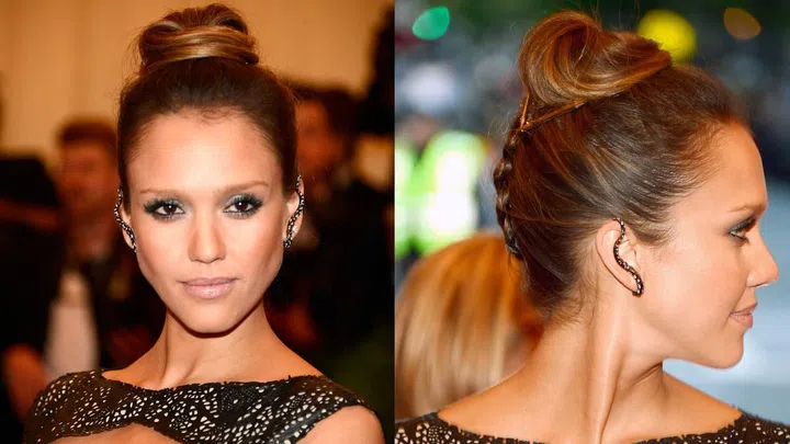 Bored by your simple bun? A thin braid extending from the nape of the neck adds excitement to a topknot.
