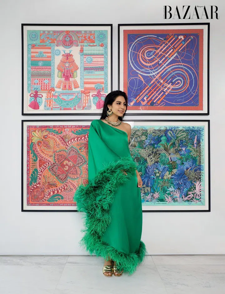 Kausar in a Taller Marmo dress, Louis Vuitton slippers, and a traditional kundan necklace and earring set. 