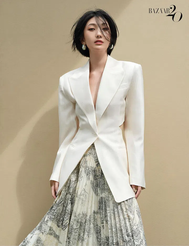 Blazer, by H&M; skirt, by Bottega Veneta; and earrings, Yao’s own. (Photo: Wee Khim)