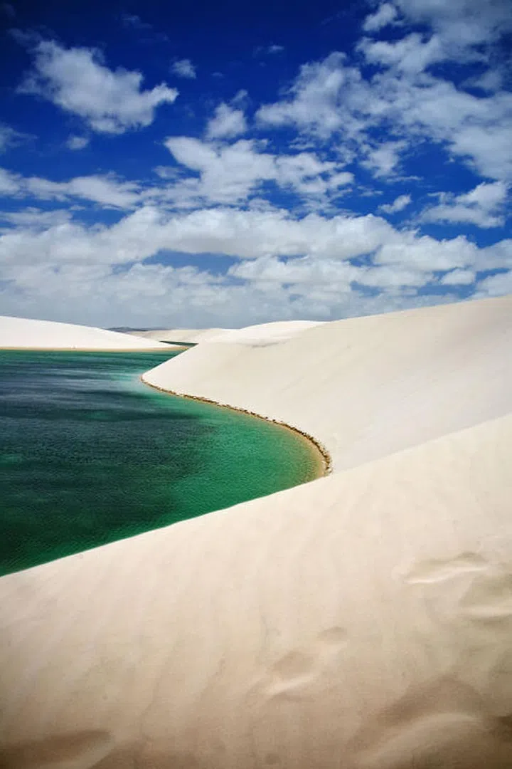 Each winter, rains collect in the sand dunes in Lençóis Maranhenses National Park creating beautiful freshwater lagoons in this remote corner of northeastern Brazil.