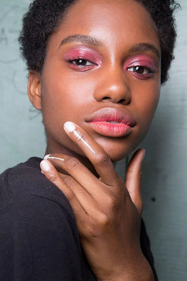 Pink, glossy eyes have never looked so good (and healthy) backstage at Tadashi Shoji.