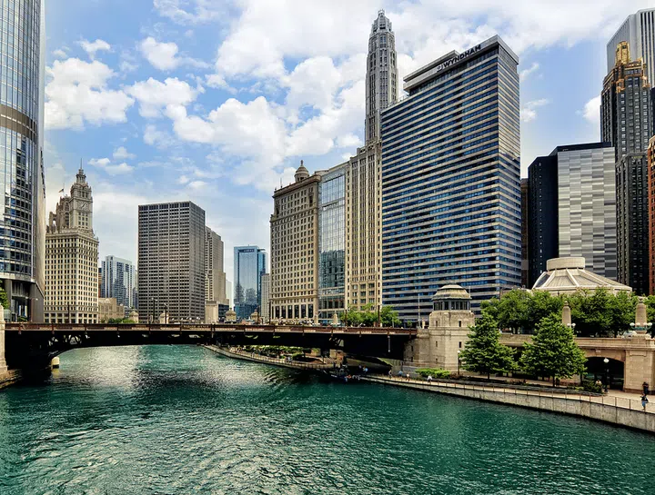 The Windy City has been upping its cool quotient for the last few years, thanks in part to design-forward hotel openings like The Robey in Wicker Park, the Ace Hotel in the West Loop, and—most recently—the 365-room St. Jane, set in an Art Deco building on Michigan Avenue. (Hyde Park’s art-focused Sophy Hotel is still to come.)

The city’s skyline shows off some amazing architectural feats, best seen through the Chicago Architecture Foundation, which offers walking tours and cruises around the river. If you’re a first-time visitor, it’s worth facing the crowds for a kissing photo op at the iconic Cloud Gate, just steps from the very-worthwhile Art Institute of Chicago. To see the bean-shaped sculpture—and the entire waterfront—from above, stop in for a bite or drinks at Cindy’s, the rooftop bar at the Chicago Athletic Association hotel. For a dream tasting-menu dinner date, reserve a table at Elske, which means “love” in Danish. The minimalist spot is run by a husband-and-wife team that works wonders on dishes like poached halibut with bok choy, glazed mussels, and chamomile. And don’t miss Kumiko, a soon-to-open bar from mixologist Julia Momose that will offer an omakase-like cocktail experience.
Photo: Getty