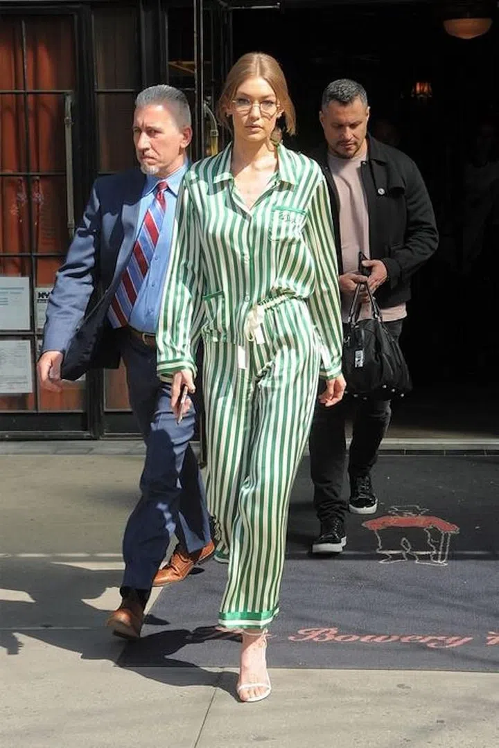 Take your silk pajama set for a day run à la Gigi Hadid.

Photo: Getty