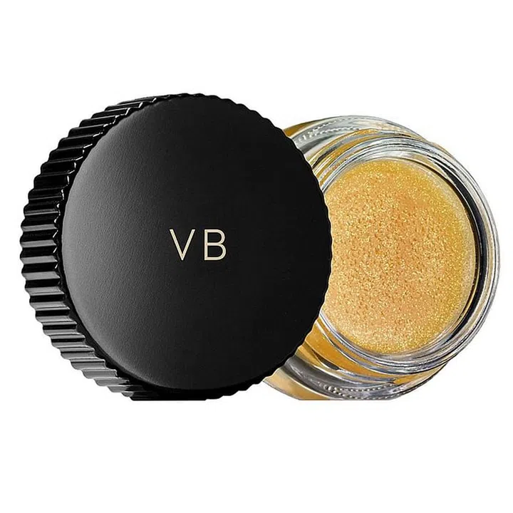 "I have a product called Aura Gloss which is like a lip balm," VB explains. "In the show this season, I put it on the lips and on the top of the cheeks of all the models. I also used it on the eyelids to give it a sort of editorial, wet look."
