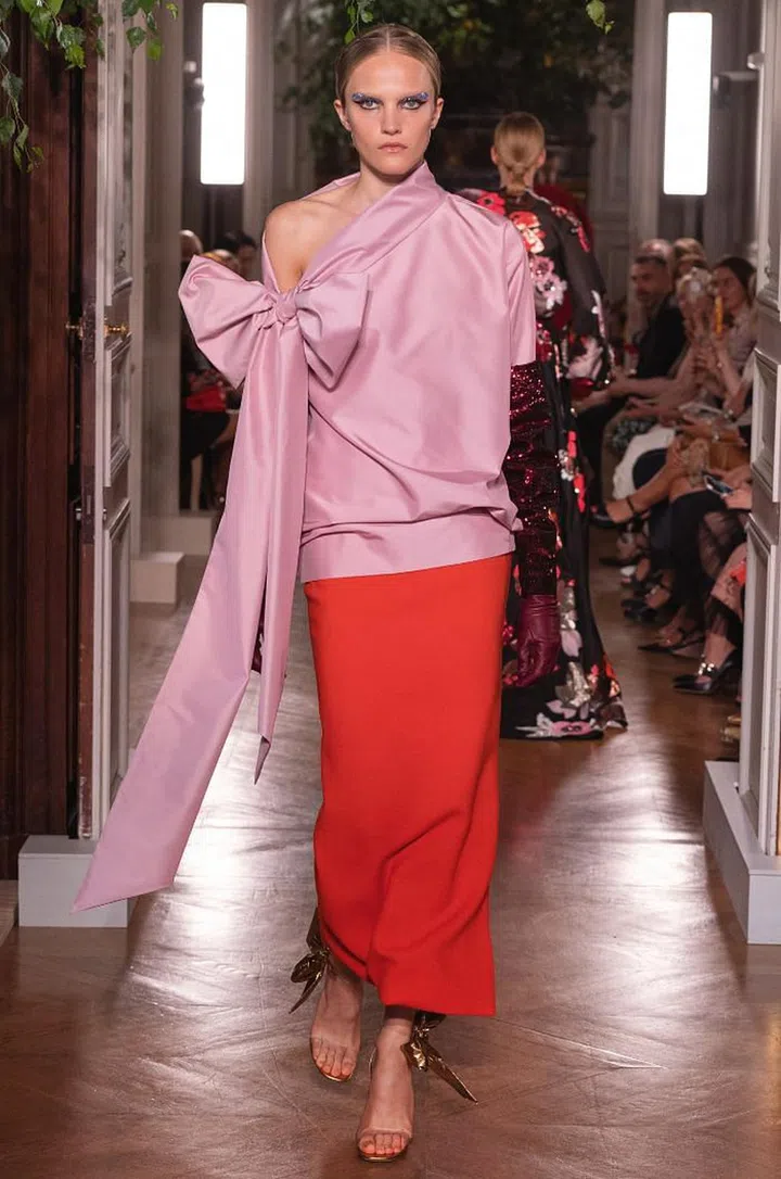 Pierpaolo Piccioli’s latest collection was about self-expression at the highest level. His ideas of inclusivity and diversity shone through not only in the brilliant casting, but also in the range of personalities and needs the collection dressed and addressed. The looks ran the gamut from restrained elegance all the way to pure fashion fantasy. In the latter camp, there were Adut Akech’s swirl of amethyst ruffles and a gown of hundreds of rose gauze squares beribboned together. On the quieter side, daywear was a standout. There were pared-back t-shirts and trousers in the most handsome materials; a taff eta coat was casually shrugged around the elbows; Lauren Hutton walked the show in a chic cashmere parka. What tied it all together was Piccioli’s use of intense, searing colour, often in gorgeously unexpected combinations such as saff ron and lilac, aubergine and pistachio, and blush and lime. Cue standing Os all around. 

Photo: Courtesy