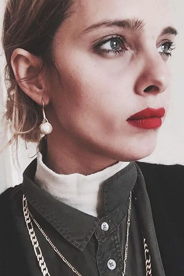 Unless you're going for a high-editorial Marlene Dietrich tribute, treat the MRL as you would a stunning piece of jewelry: faux-carelessly, worn with quiet clothes, brushed-up fluffy brows, and not much else makeup, save for a few lashings of mascara and maybe some liner pushed into the lashline. 