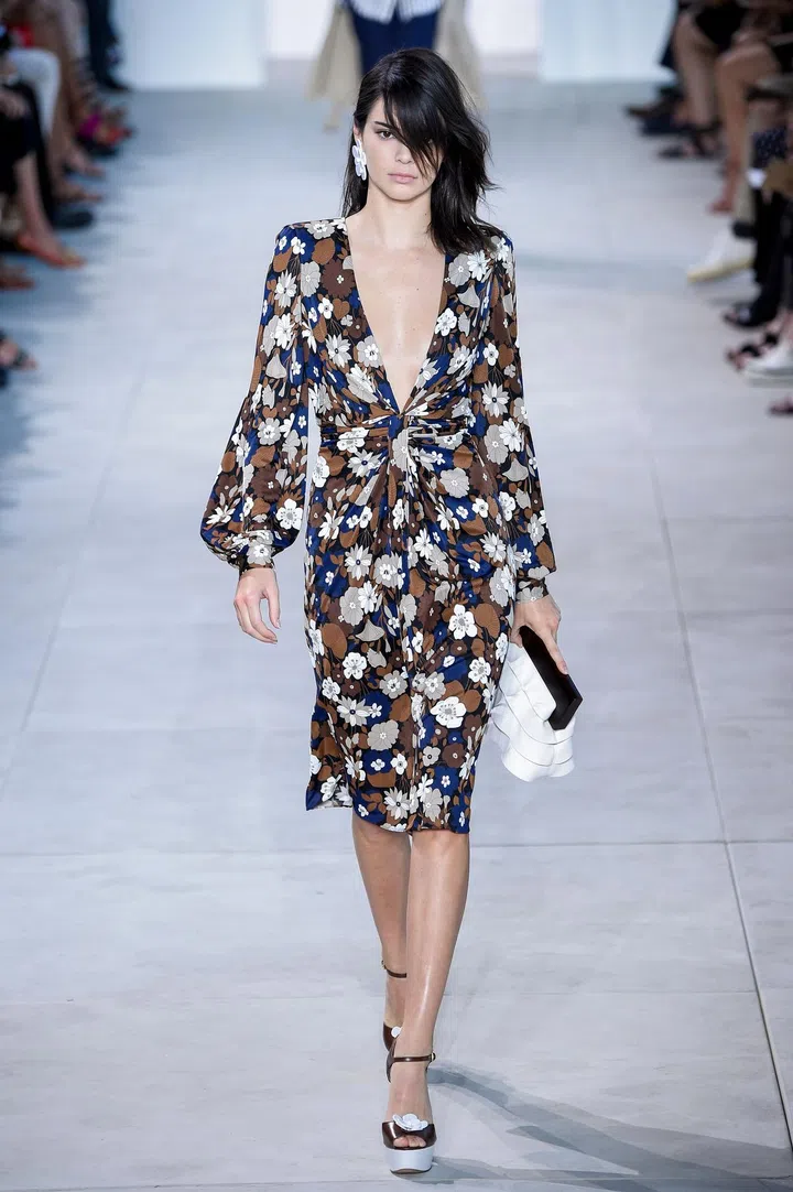 Kendall Jenner in a look from Kors' spring 2017 runway. Photo: Getty
