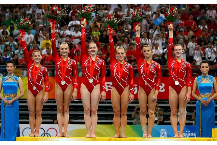 The U.S. women's gymnastics team after their silver medal win at the Olympic Games in Beijing. Nike and Adidas are the biggest sponsors this year, duking it out for supremacy of the games. Photo: Getty