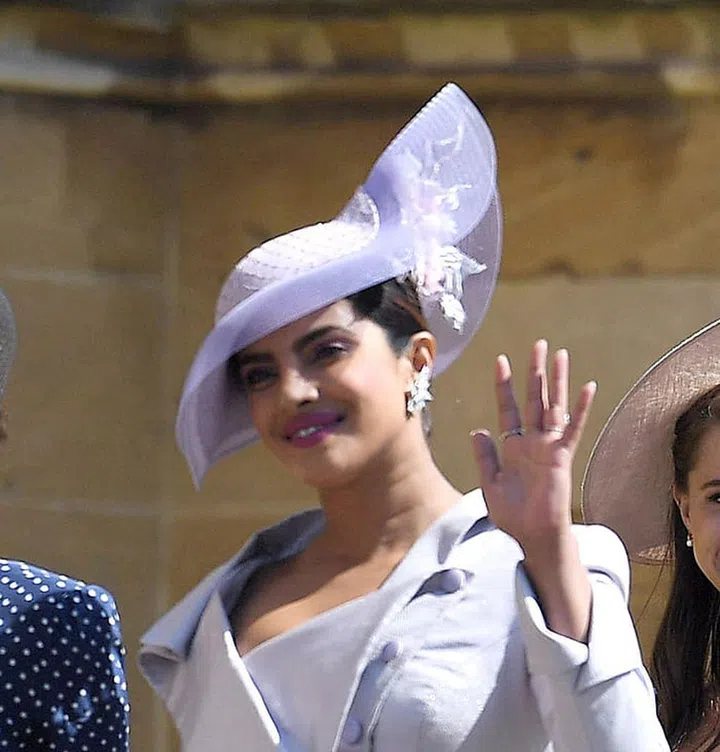 Wearing Philip Treacy. Photo: Getty